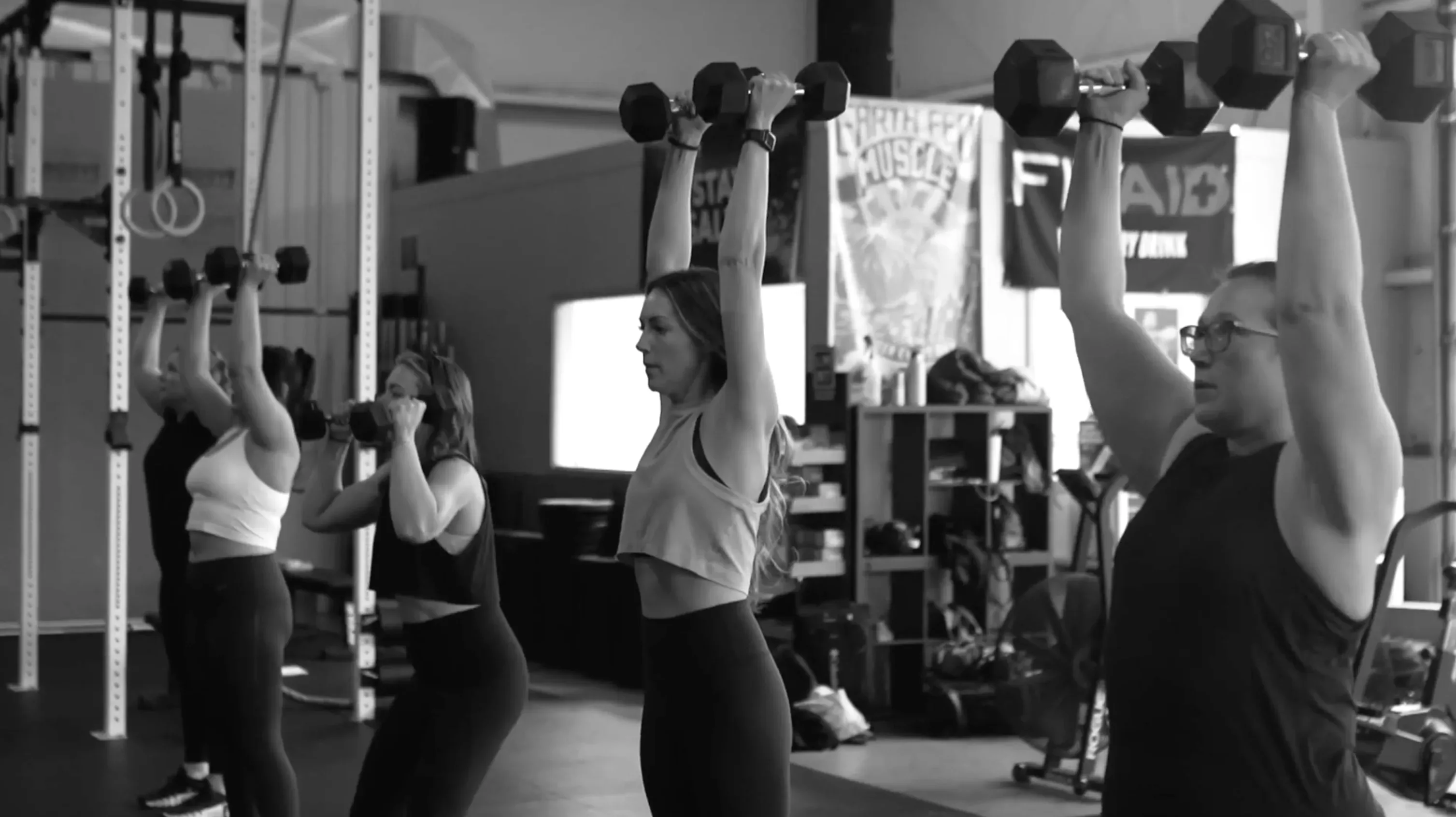 Group strength training class at Elevate Motion Gym